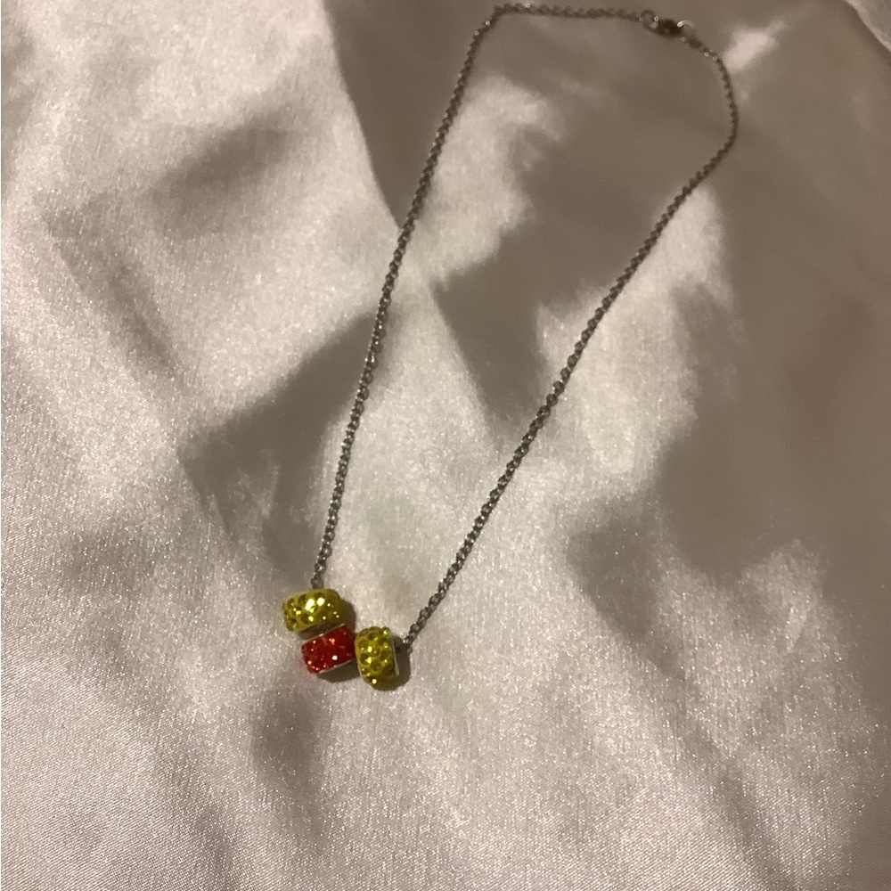 Sterling silver necklace with gem pendant.